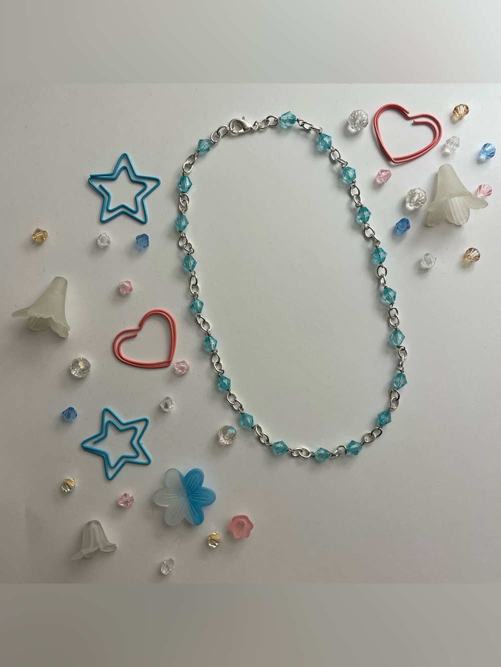 Silver chain necklace with aqua beads